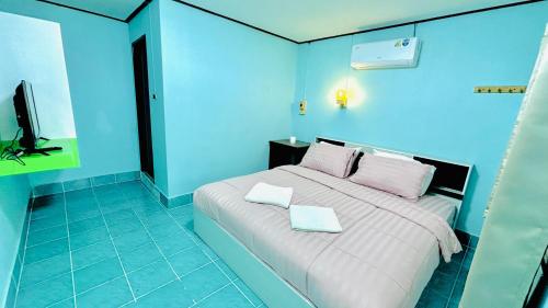 Ένα ή περισσότερα κρεβάτια σε δωμάτιο στο Alanta aonang resort