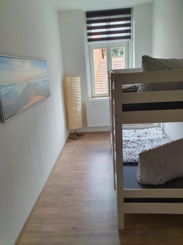 Postel nebo postele na pokoji v ubytování Fewo's Ahrend