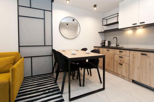 Kuchyňa alebo kuchynka v ubytovaní Apartament 420 Green Port Basen & Jacuzzi Kołobrzeg