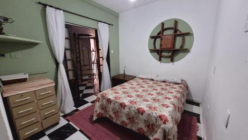 Ένα ή περισσότερα κρεβάτια σε δωμάτιο στο Casa Refúgio Caiçara no Sertão