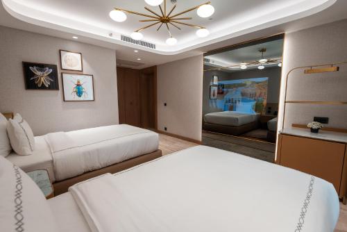 Postel nebo postele na pokoji v ubytování Gloria Serenity Resort