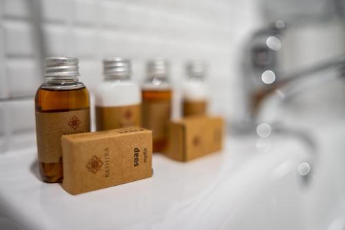 a group of bottles of honey on a counter at Słoneczne Wzgórze in Tarnów