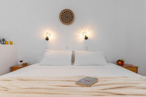 Ένα ή περισσότερα κρεβάτια σε δωμάτιο στο NAXOS BEACHWALK