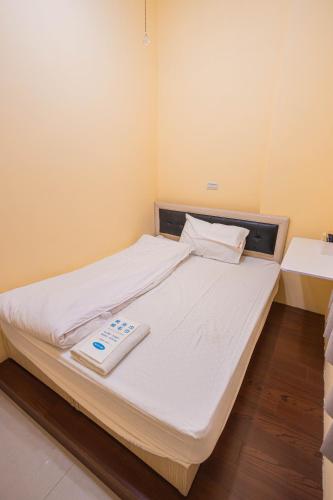 Un ou plusieurs lits dans un hébergement de l'établissement 頭城遊龍戲鳳賞鯨會館2館