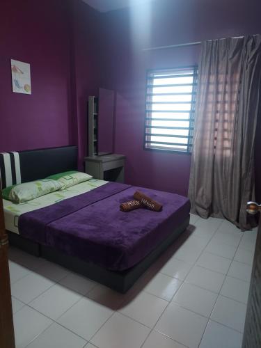 Ένα ή περισσότερα κρεβάτια σε δωμάτιο στο Apartment pelindung seaview