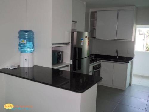 Ap em Maragogi, com 4 quartos, Peroba Ville Residenceにあるキッチンまたは簡易キッチン