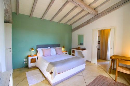 Ένα ή περισσότερα κρεβάτια σε δωμάτιο στο Villa Il Pozzo