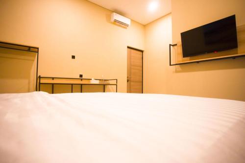 SH Hotelにあるテレビまたはエンターテインメントセンター