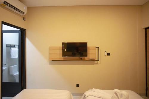 SH Hotelにあるテレビまたはエンターテインメントセンター