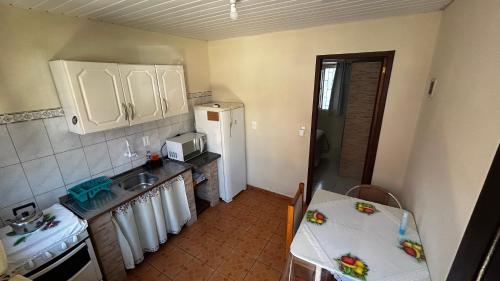 Kuchyň nebo kuchyňský kout v ubytování Kitnet 2 - Caminhos da Joaquina