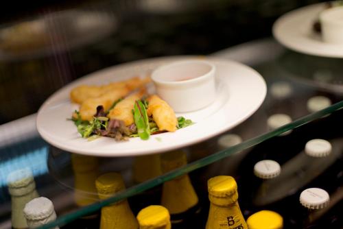 a plate of food on a table with a plate of food at YHA Liverpool Albert Dock in Liverpool