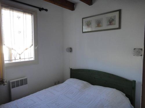 Photo de la galerie de l'établissement Belle villa plein sud climatisée 4 couchages 2 chambres terrasse, piscine commune parking dans résidence sécurisée 200m de la plage LRMA54, à Portiragnes