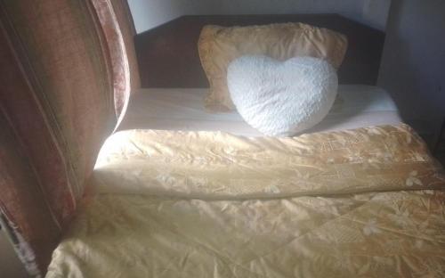 Ένα ή περισσότερα κρεβάτια σε δωμάτιο στο Puertohumo