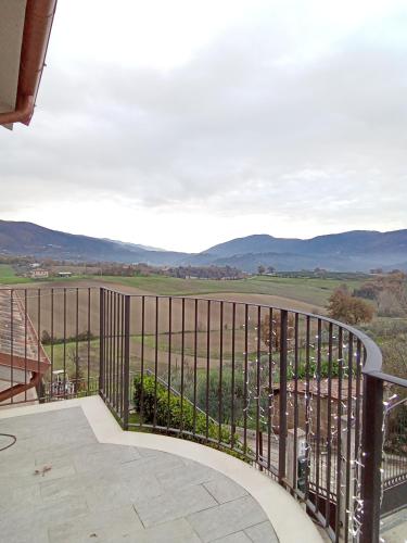 a balcony with a view of the mountains at La Casa nella Contea in Terni