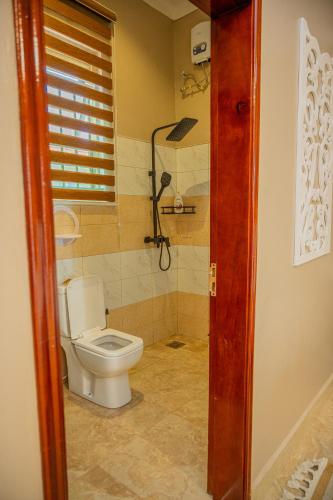 Kupatilo u objektu Kush Homes