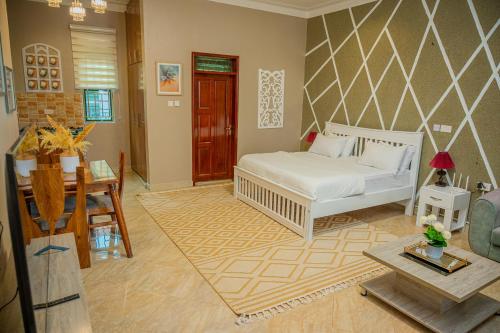 Krevet ili kreveti u jedinici u okviru objekta Kush Homes