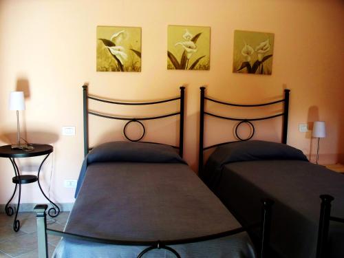 Ένα ή περισσότερα κρεβάτια σε δωμάτιο στο Agriturismo Le Cantine