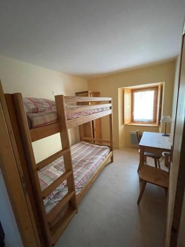 Postel nebo postele na pokoji v ubytování Alpes Montjoie