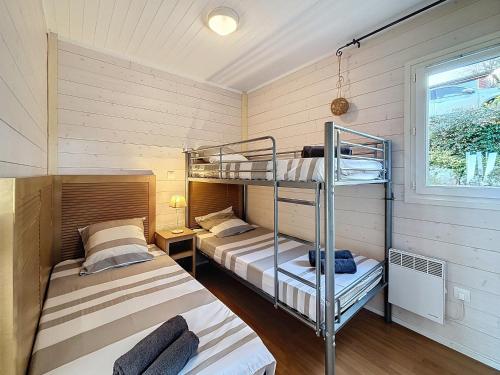 Postel nebo postele na pokoji v ubytování Chalet de la Butte aux Cerfs