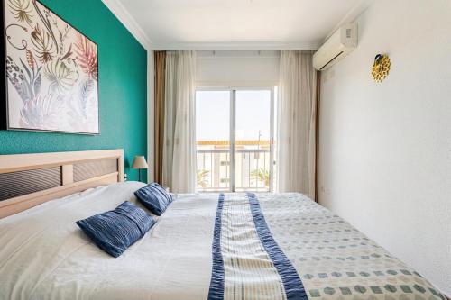 Posteľ alebo postele v izbe v ubytovaní Apartment Playa la Arena