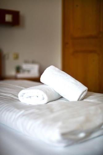 Postel nebo postele na pokoji v ubytování Hotel Andreas Hofer