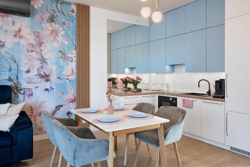 Η κουζίνα ή μικρή κουζίνα στο Boszkowo Horizon Park Apartament 37 "Mildgarden"