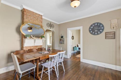 a dining room with a table and chairs at Uptown Cottage- mins away from Downtown in Chattanooga