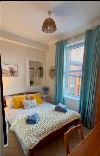Postel nebo postele na pokoji v ubytování Cozy flat in the heart of Perth