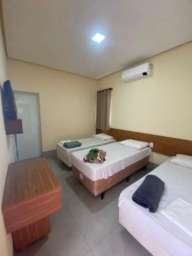 Postel nebo postele na pokoji v ubytování Hotel do Didi