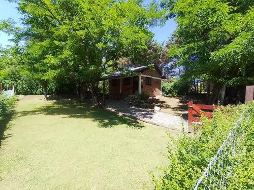 Jardín al aire libre en Cabaña Los ALAMOS