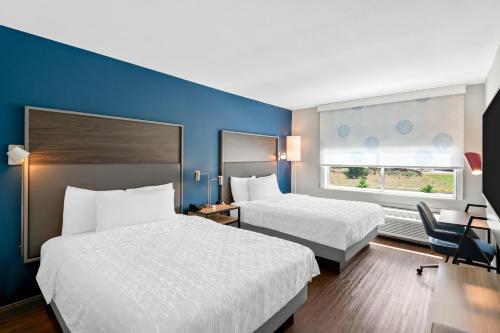 Postel nebo postele na pokoji v ubytování Tru By Hilton Spokane Valley, Wa