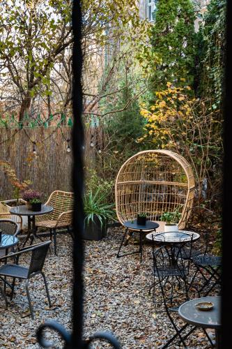 a view of a patio with tables and chairs at Great Polonia Dwarf Wrocław in Wrocław