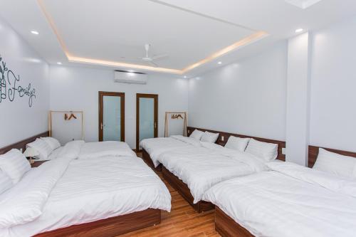 Katil atau katil-katil dalam bilik di Nắng House MỘC CHÂU