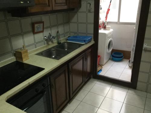 モライラにあるLa Casonaのキッチン(シンク、食器洗い機付)