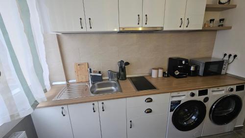 Una cocina o cocineta en Central View Apartment
