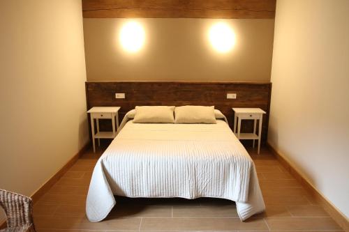 Hostal-Cicloturismo Lopeneaにあるベッド