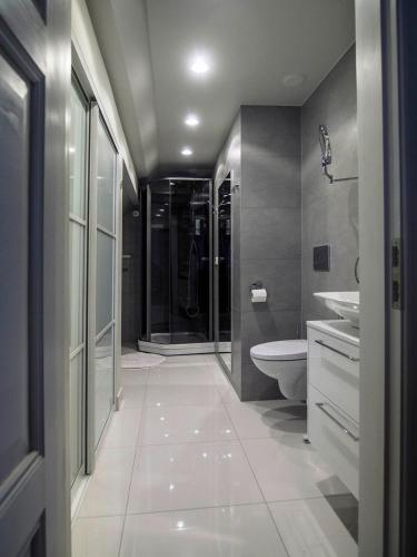 Vannituba majutusasutuses Katrina Apartment