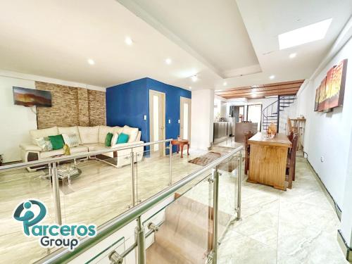 a view of the living room of a house at Apartamentos Amoblados En La Circunvalar Cerca a Parque Arboleda y Parque La Rebeca, Por Parceros Group in Pereira
