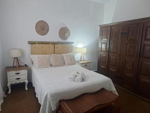 Ένα ή περισσότερα κρεβάτια σε δωμάτιο στο BemDita Casa