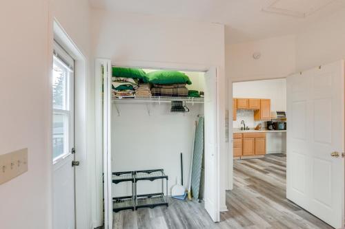 a small room with a bed on a shelf at Apt with Lake Views - Day Trip to Virginia Tech! in Radford