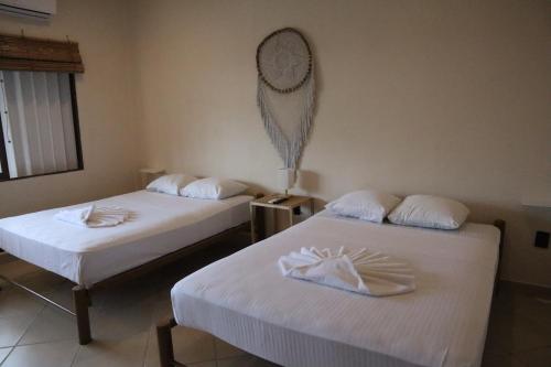 Postel nebo postele na pokoji v ubytování 3B Wellness Hotel & Hostel Adults Only