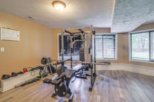 a gym with treadmills and machines in a room at Linden Family Home with Yard Less Than 5 Mi to Wineries! in Front Royal