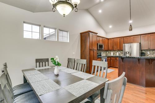 a kitchen and dining room with a table and chairs at Eugene Area Home 18 Mi to U of O! in Junction City
