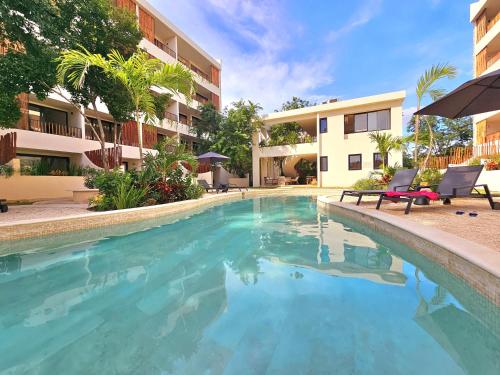 Bazén v ubytování Loch Tulum Condos by Bunik nebo v jeho okolí