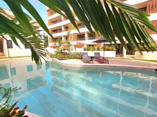 Bazén v ubytování Loch Tulum Condos by Bunik nebo v jeho okolí