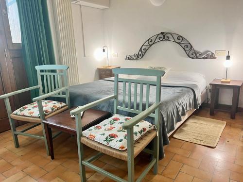 Postel nebo postele na pokoji v ubytování Agriturismo Podere La Fornace
