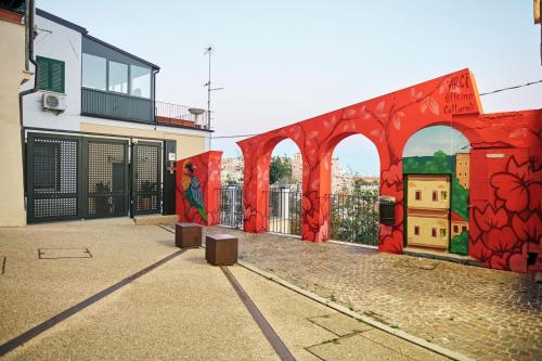 a mural on the side of a building at Relais al Teatro in Chieti