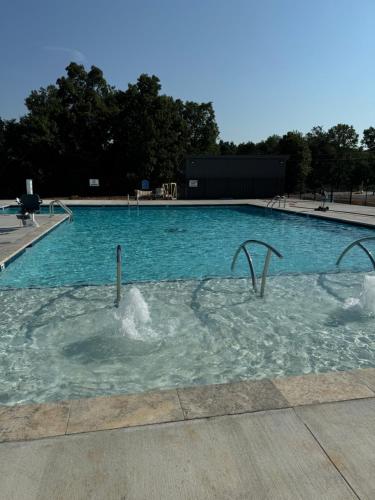 a large swimming pool with water in it at Piney River Resort in Bon Aqua