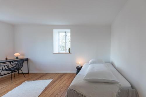 Ένα ή περισσότερα κρεβάτια σε δωμάτιο στο Villa Morgenthau