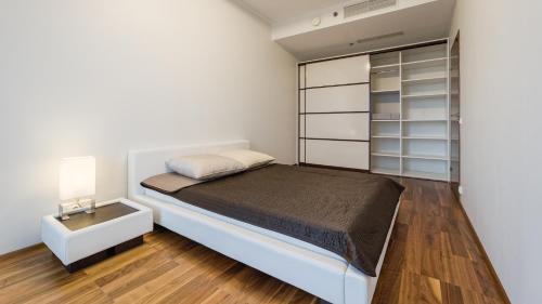 Ένα ή περισσότερα κρεβάτια σε δωμάτιο στο Revalia Tornimäe Amazing Views Premium Apartments
